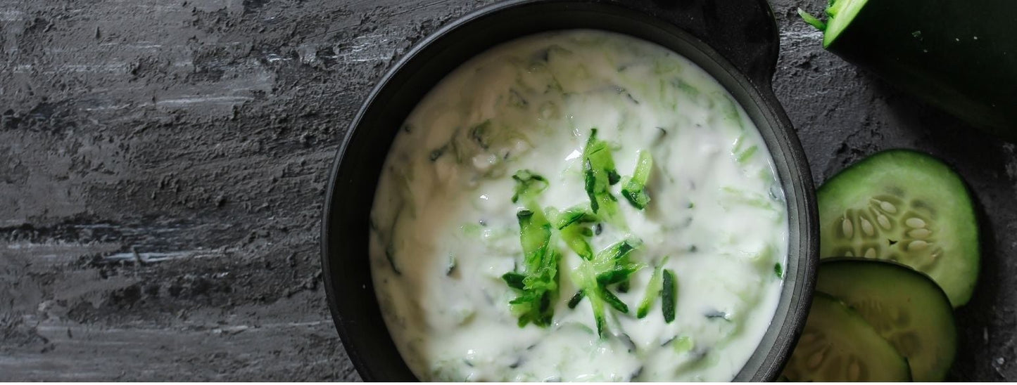 Raita- white yogurt with cucumbers and spices